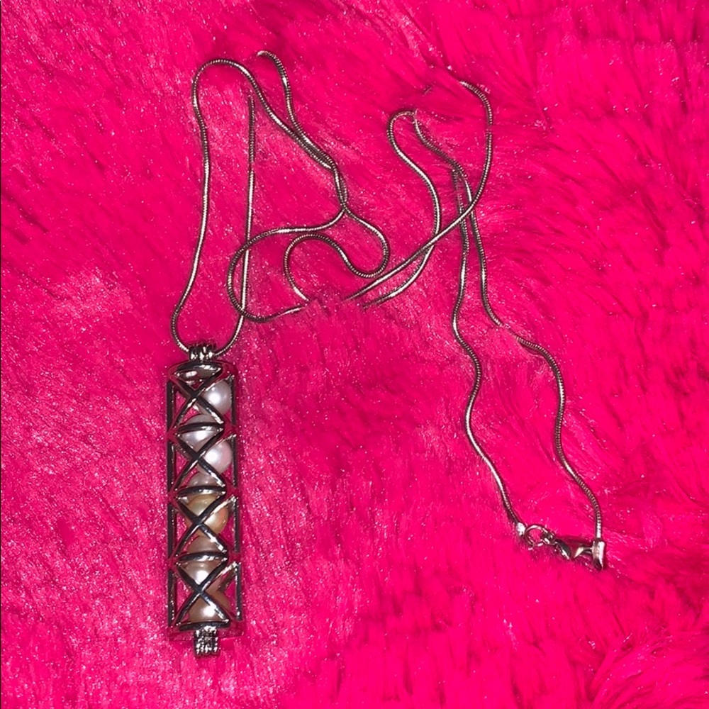 Cylinder cage necklace with 8 Akoya pearls